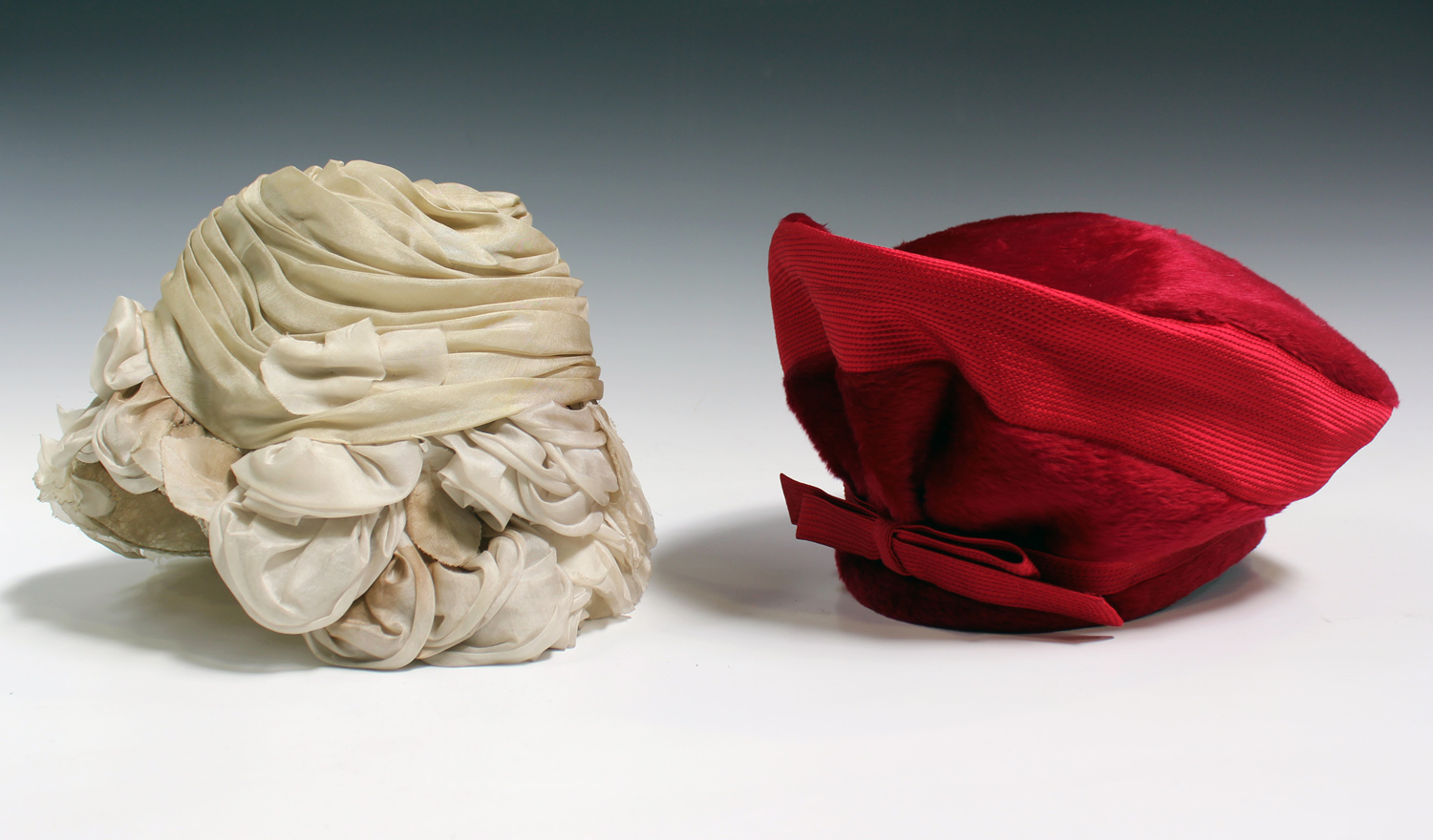 A mid-20th century red plush lady's hat, labelled 'Christian Dior ...