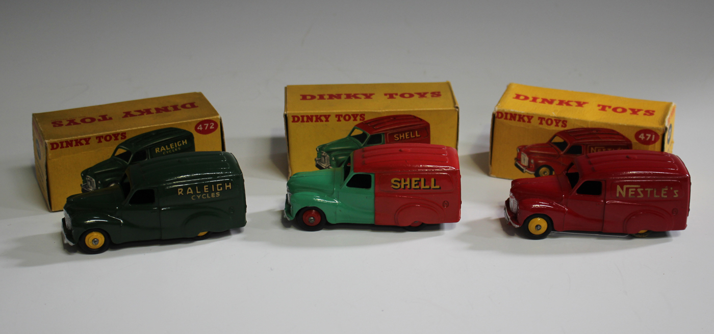Three Dinky Toys Austin vans, comprising a No. 470 'Shell/BP', a