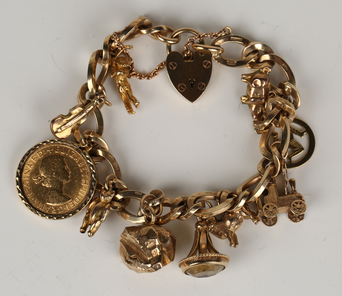 A 9ct gold curblink bracelet, mounted with an Elizabeth II sovereign ...