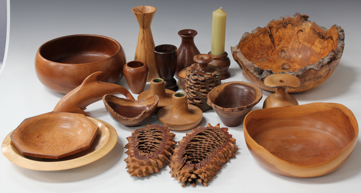 A collection of turned wood objects, including a goblet and a ...
