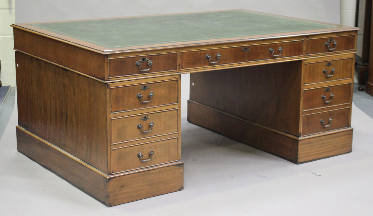 A Modern Reproduction Mahogany Twin Pedestal Partners Desk Fitted