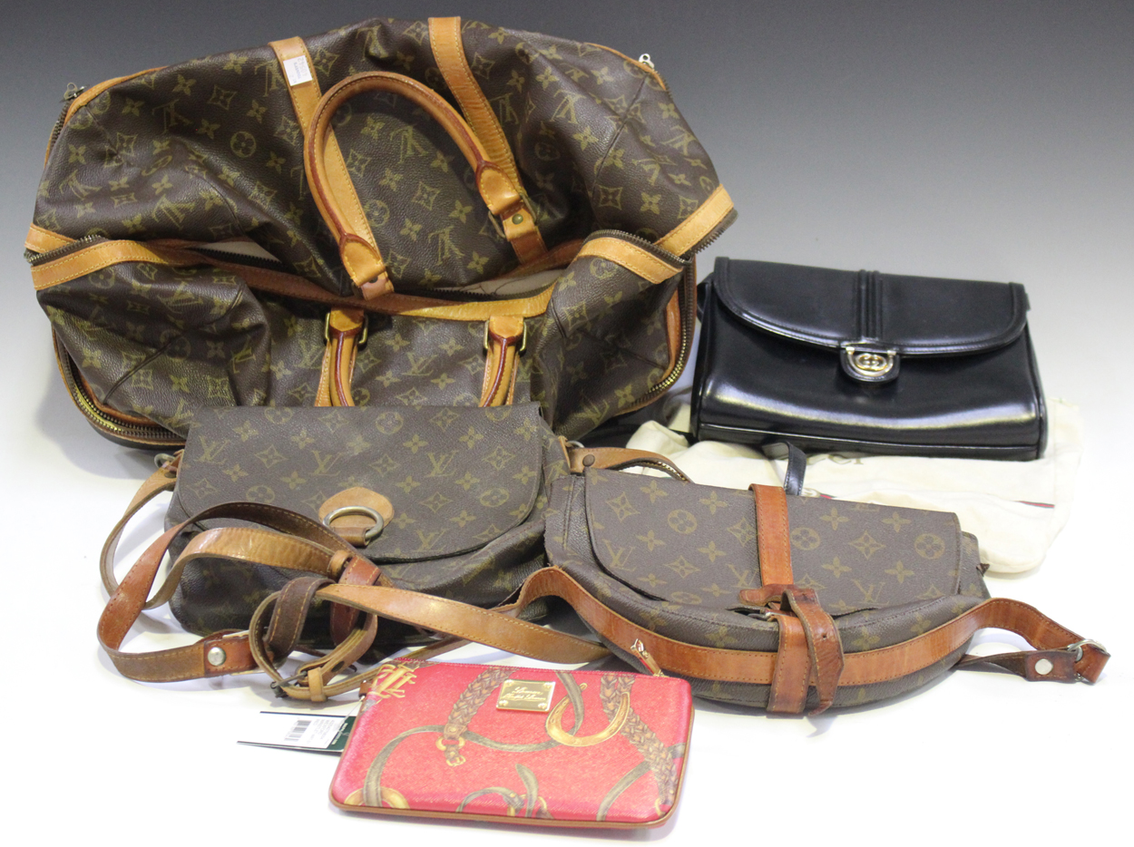 A Louis Vuitton replica bag, two other similar shoulder bags, a