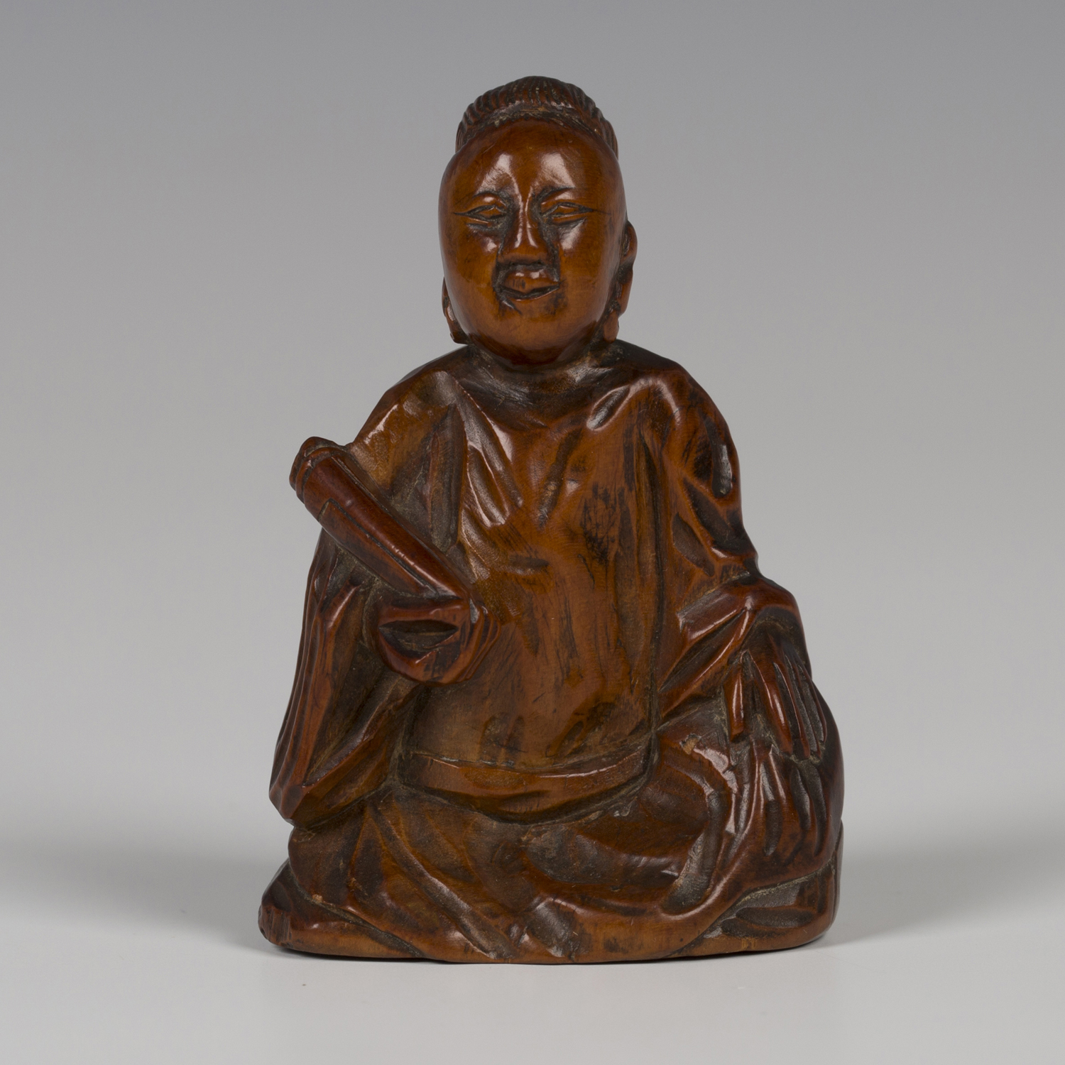 A Chinese carved boxwood figure of a maiden, 18th century, finely ...