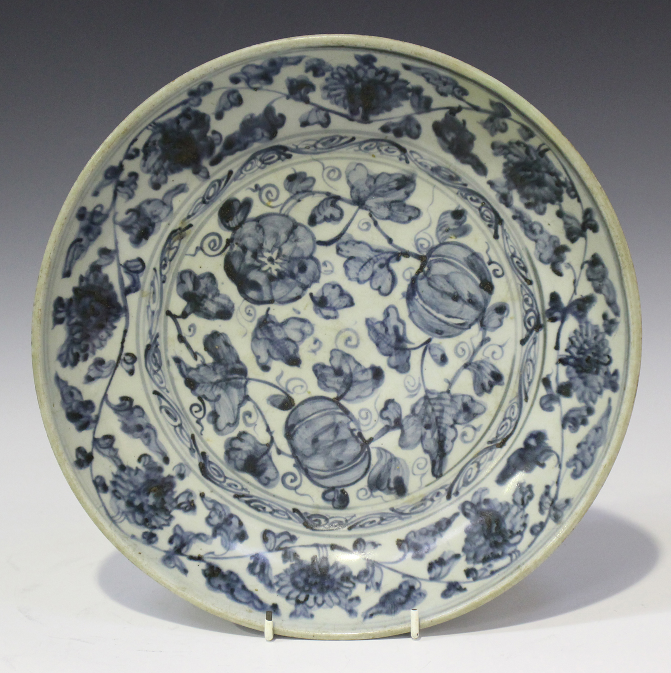 A Chinese Provincial blue and white porcelain saucer dish, Ming dynasty ...