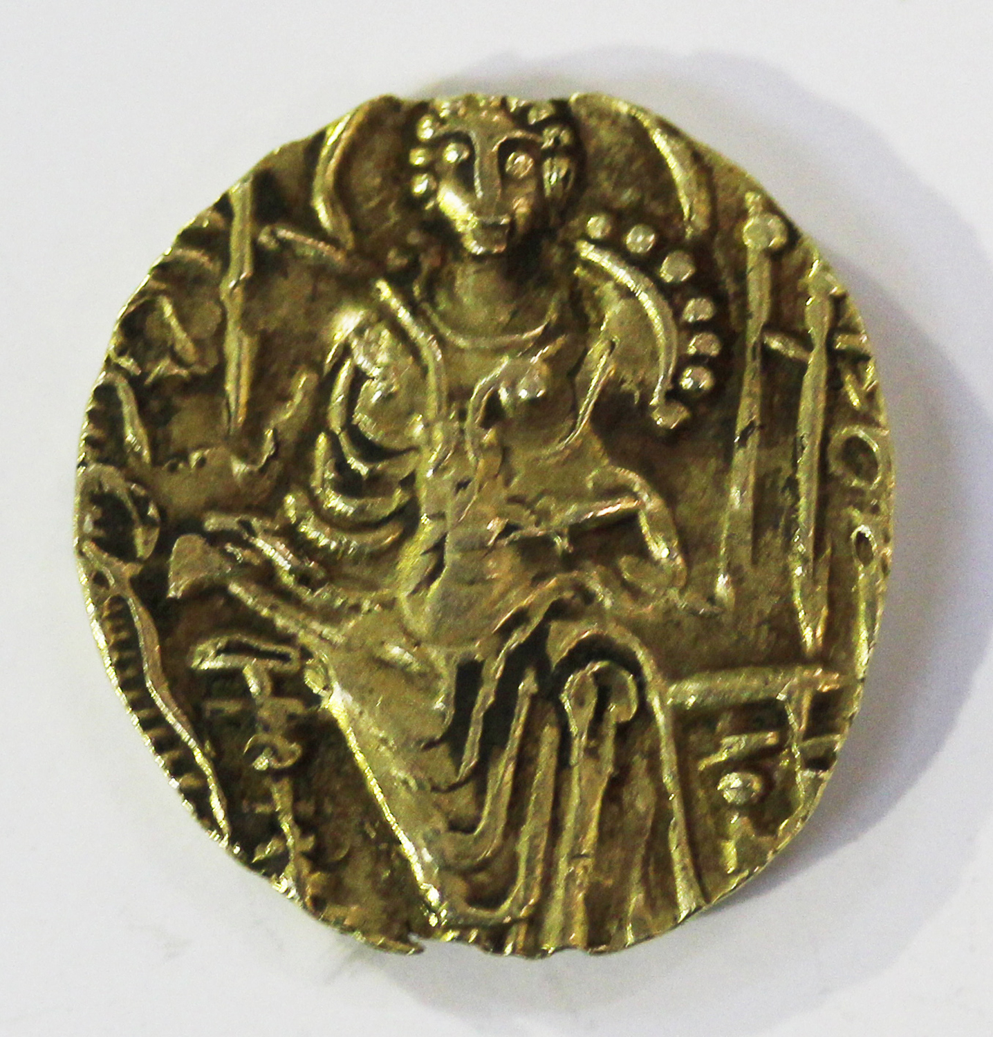 An India late Kushan Shaka gold stater.