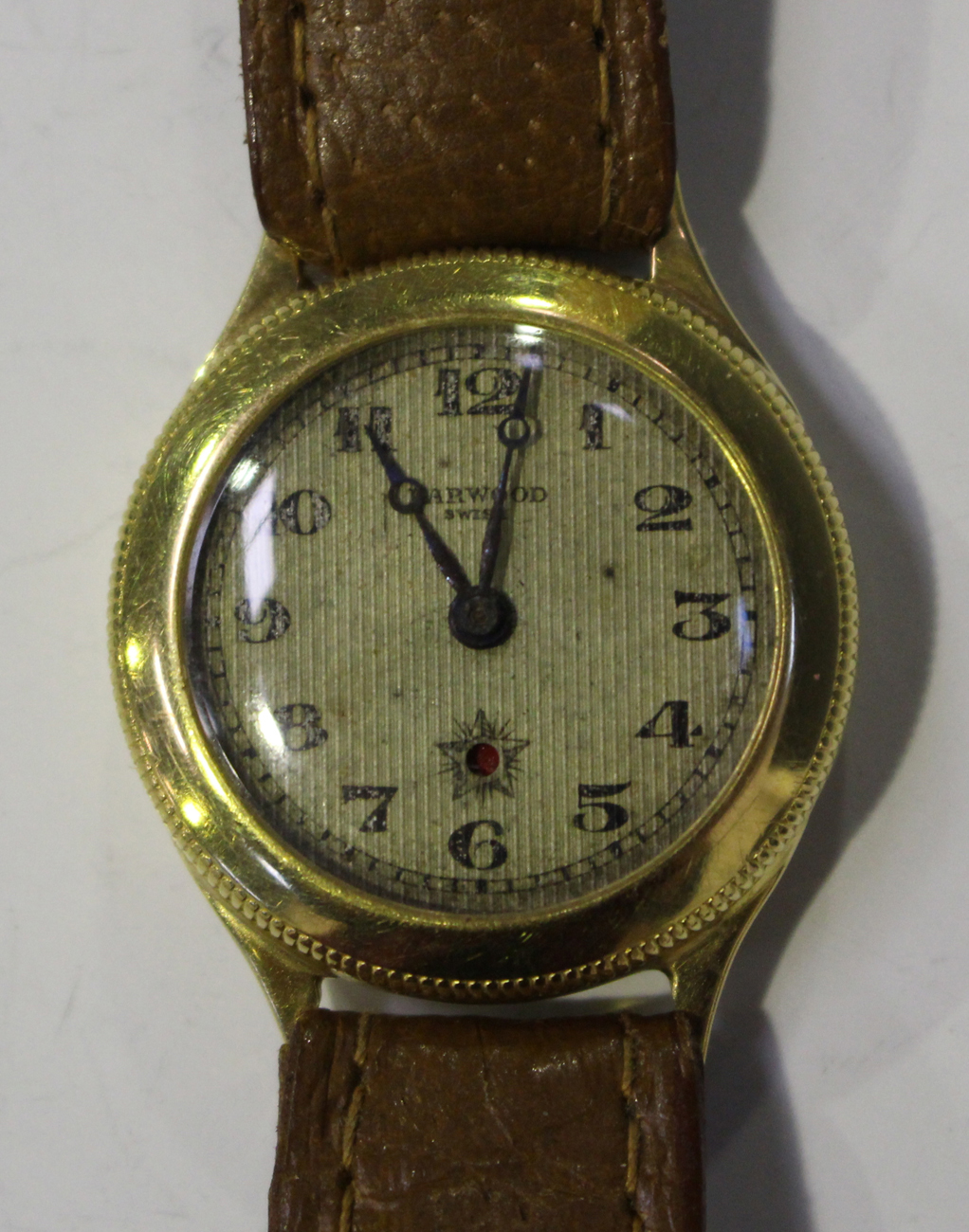 A Harwood self-winding Watch Co Ltd 18ct gold circular cased wristwatch ...