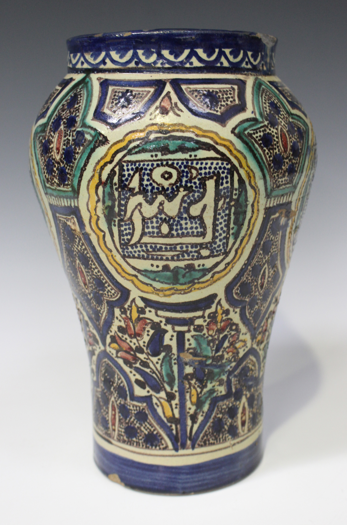 An Islamic pottery vase, probably Moroccan, late 19th/early 20th