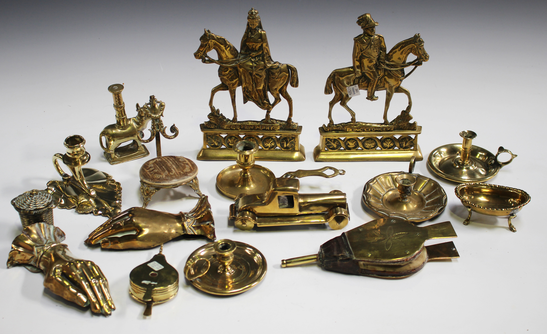 A good collection of mainly Victorian brass novelty items, including two  miniature models of bellows