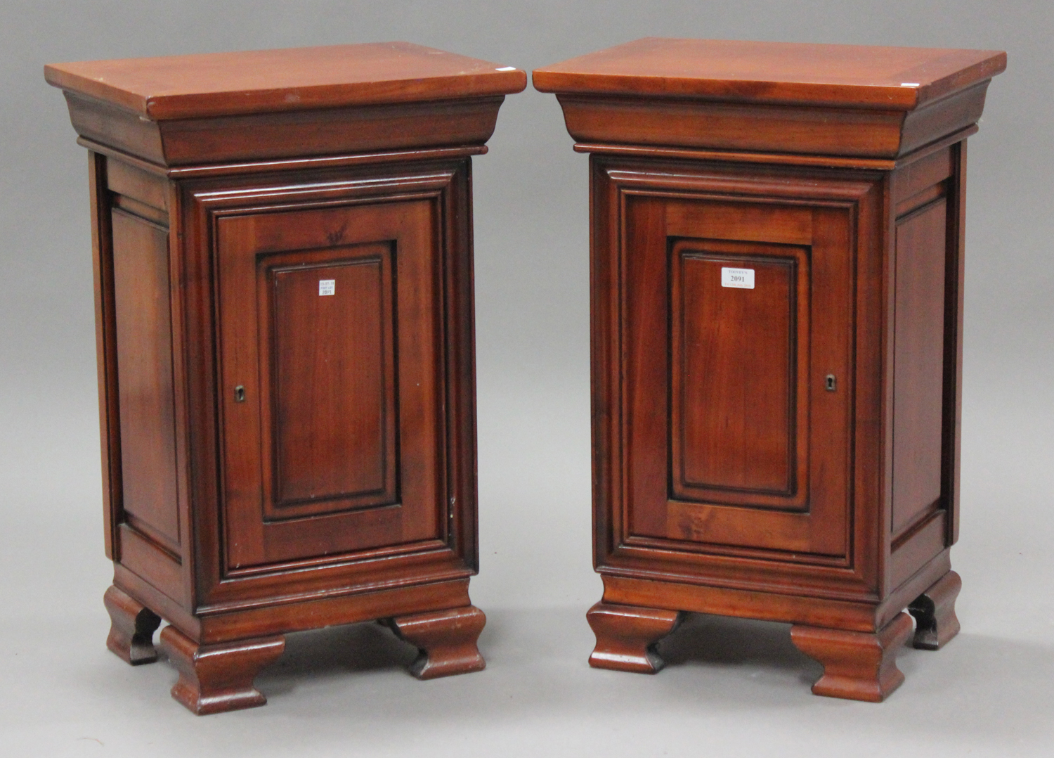 A Pair Of Modern Cherrywood Bedside Cabinets On Ogee Bracket Feet