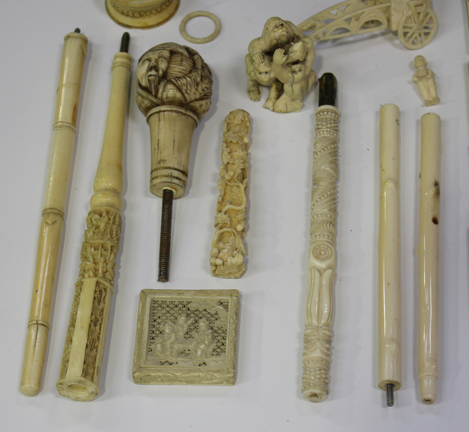 A collection of Chinese Canton carved ivory items, mid-19th