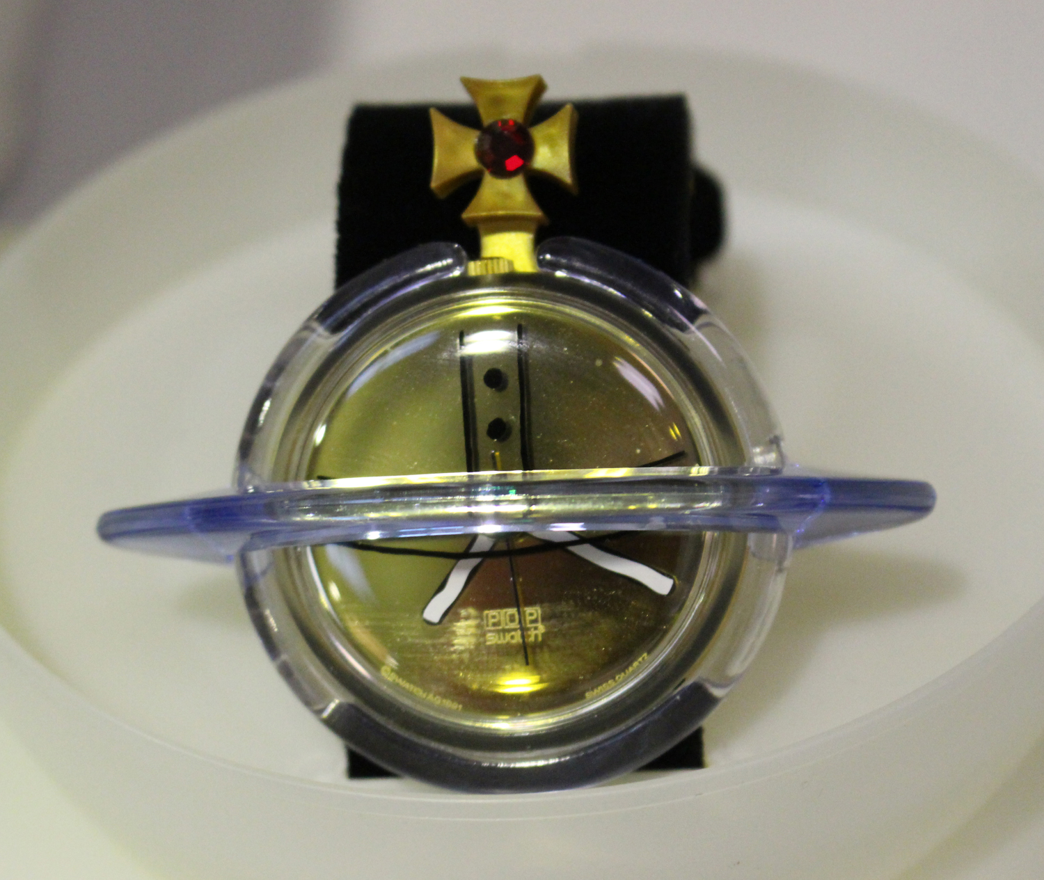 A Vivienne Westwood orb design pop Swatch wristwatch with A Vivienne Westwood orb design pop Swatch wristwatch with