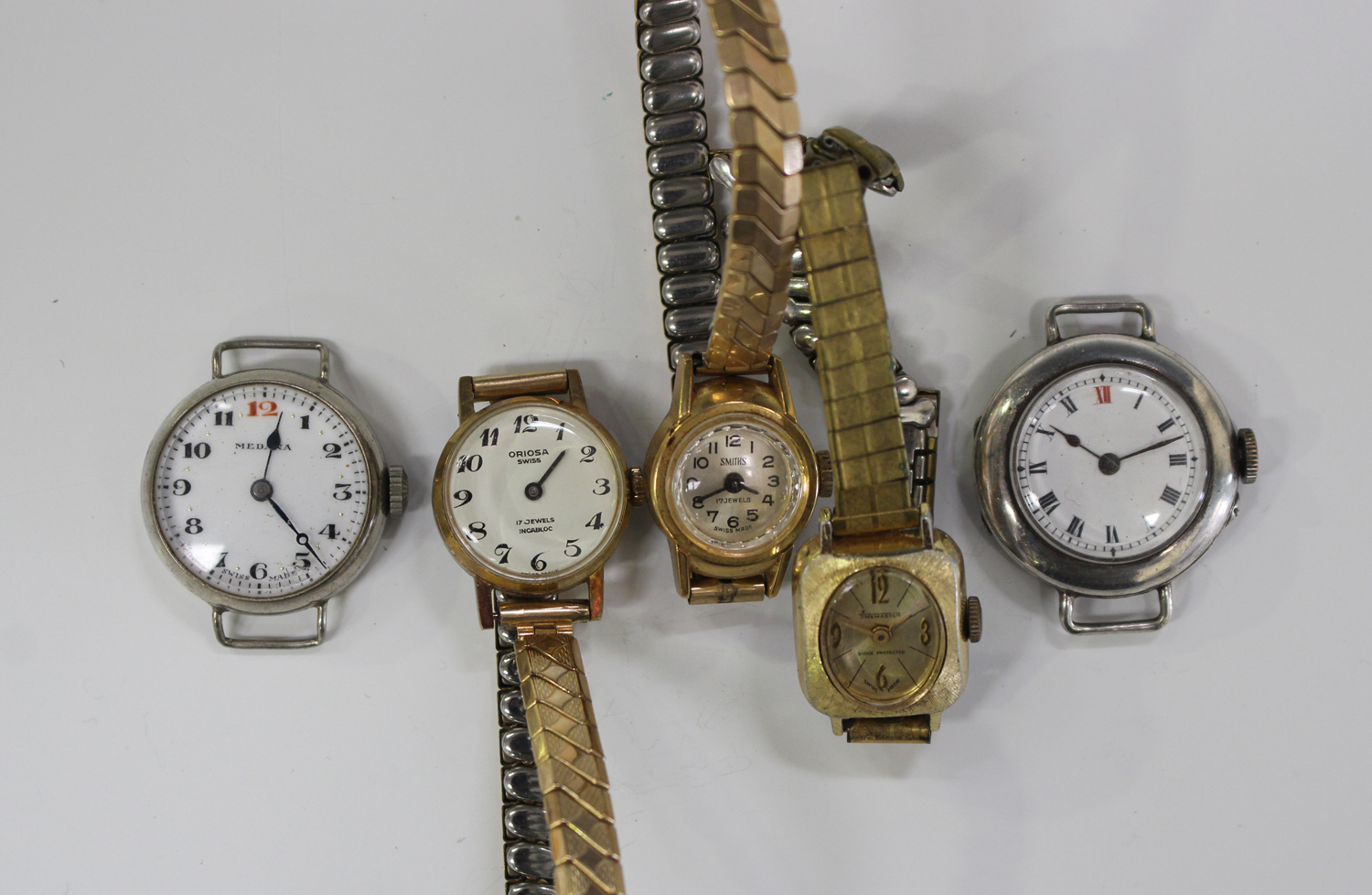 A group of twelve gentlemen's wristwatches, including Interpol 25 ...