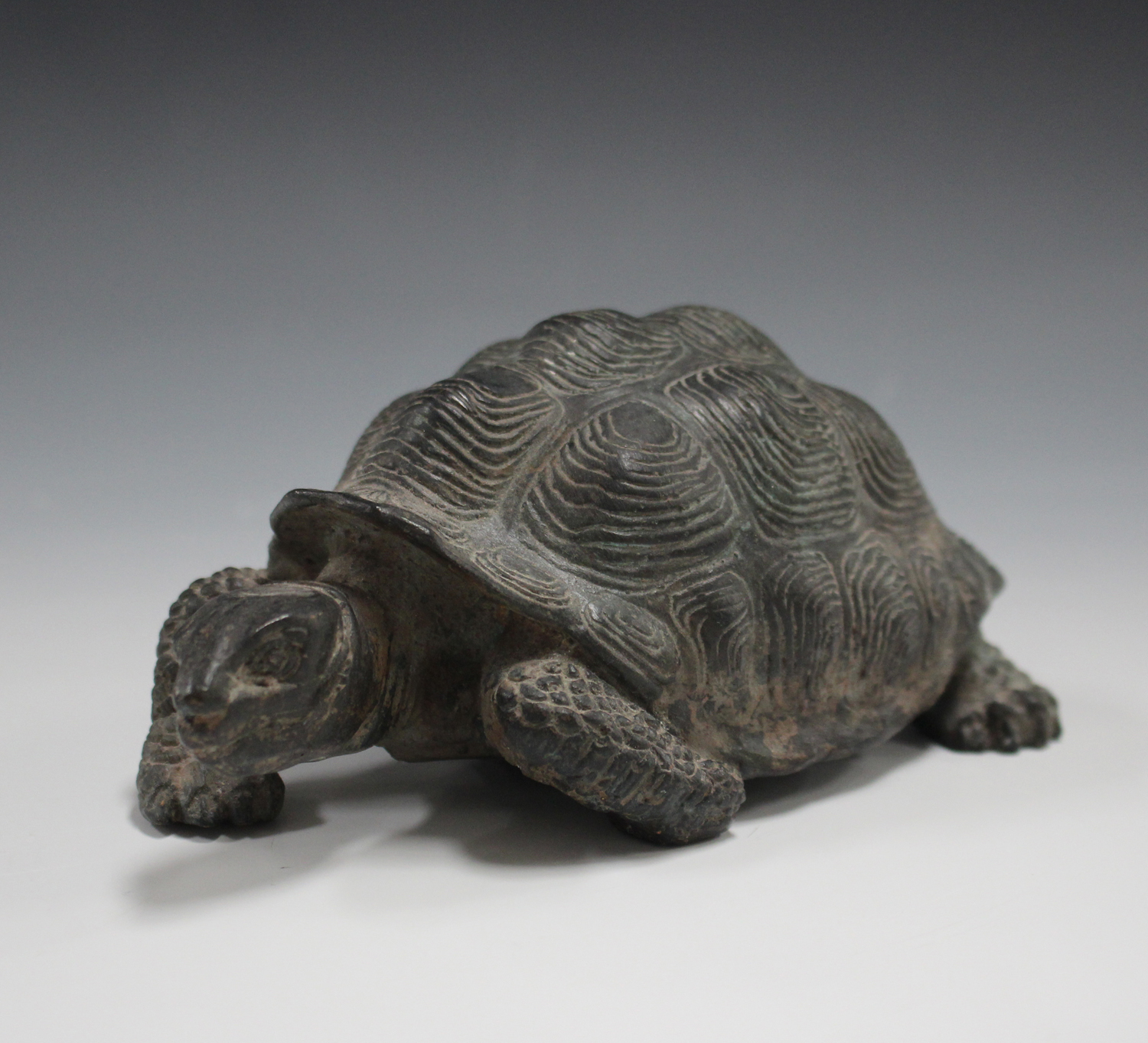 A 20th century green patinated cast bronze model of a tortoise, length ...