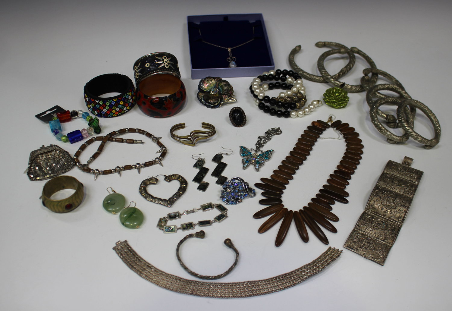 A large collection of costume jewellery, including necklaces, bangles ...