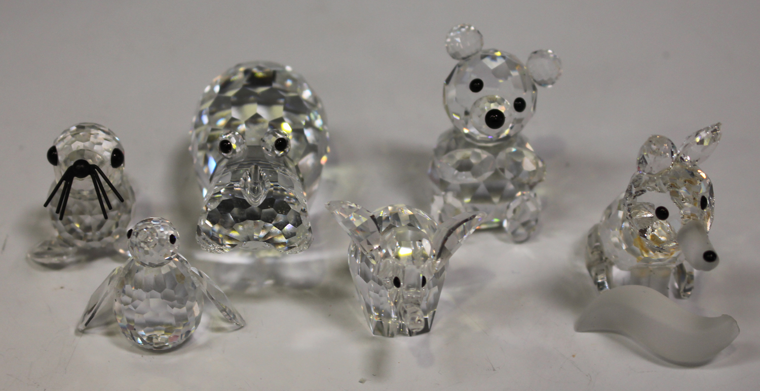 Six small Swarovski Crystal animals, comprising elephant, seal, hippo,  bear, penguin and fox (tail p