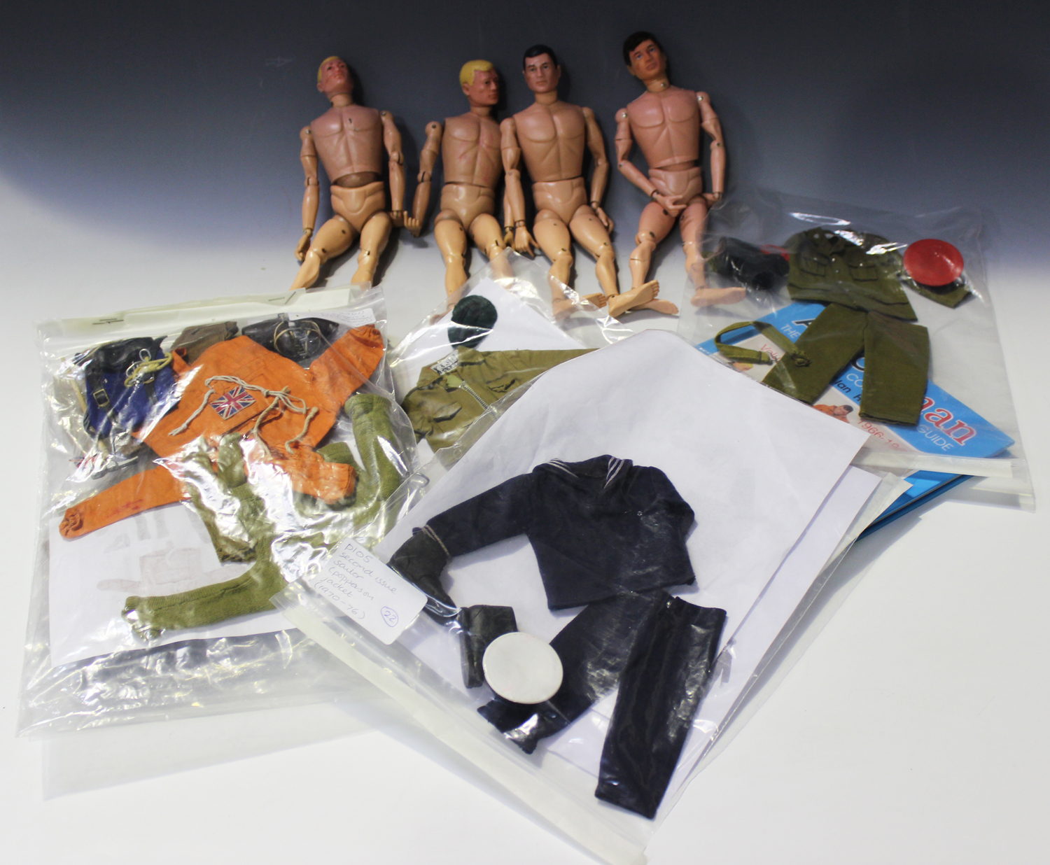 A good collection of Palitoy Action Man figures and accessories ...