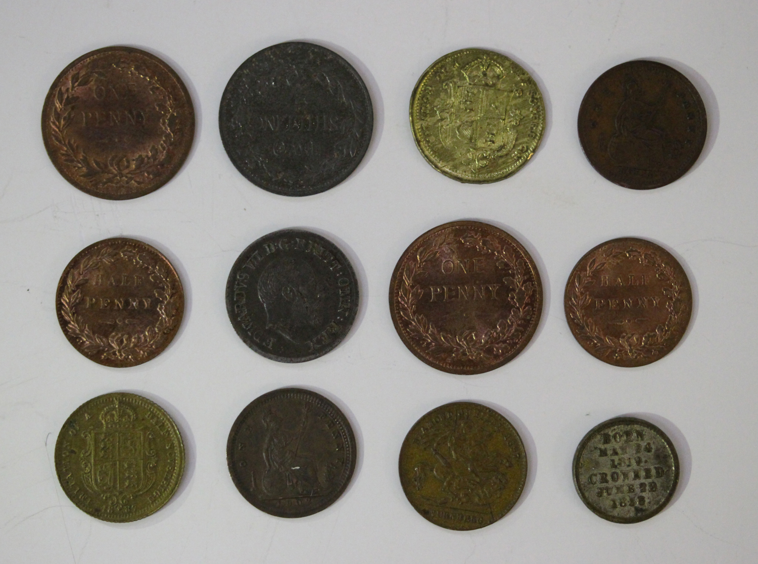 A small collection of Victorian and Edwardian toy money including two Lauer Nurnberg models a