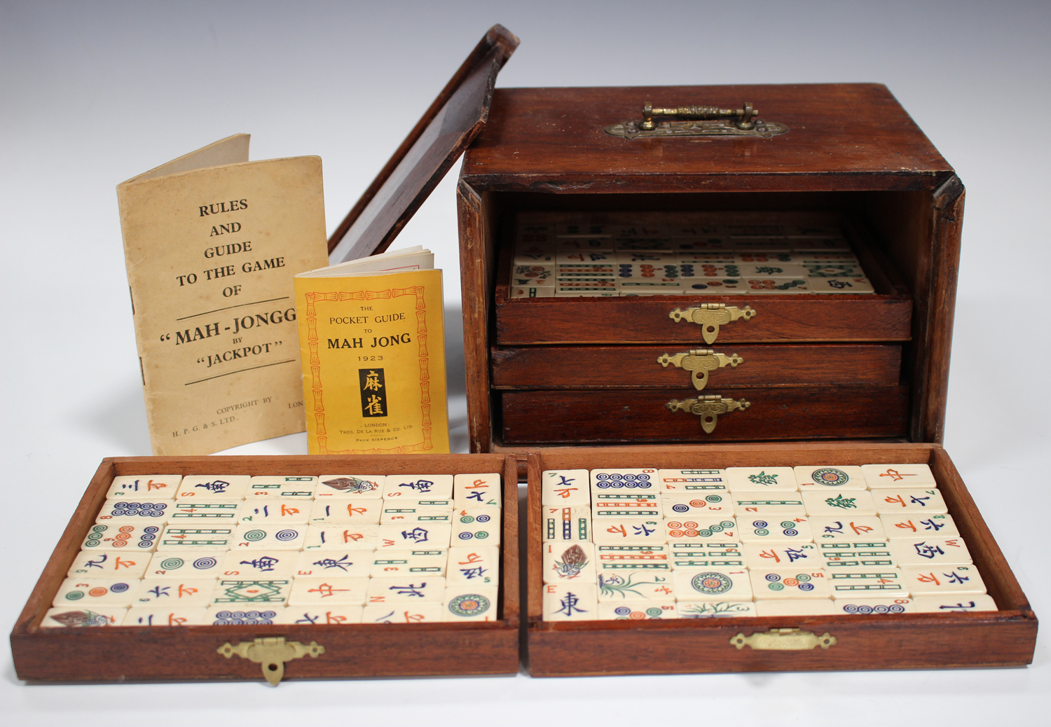 A Chinese Mahjong set, early 20th century, with bone and bamboo tiles,  contained within a five drawe