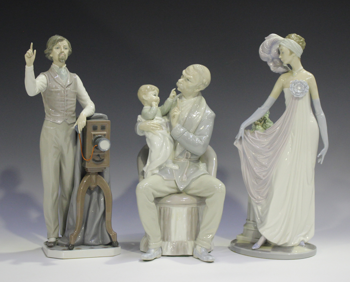 Three Lladro figures, comprising Say Cheese, No. 5195, The Grandfather