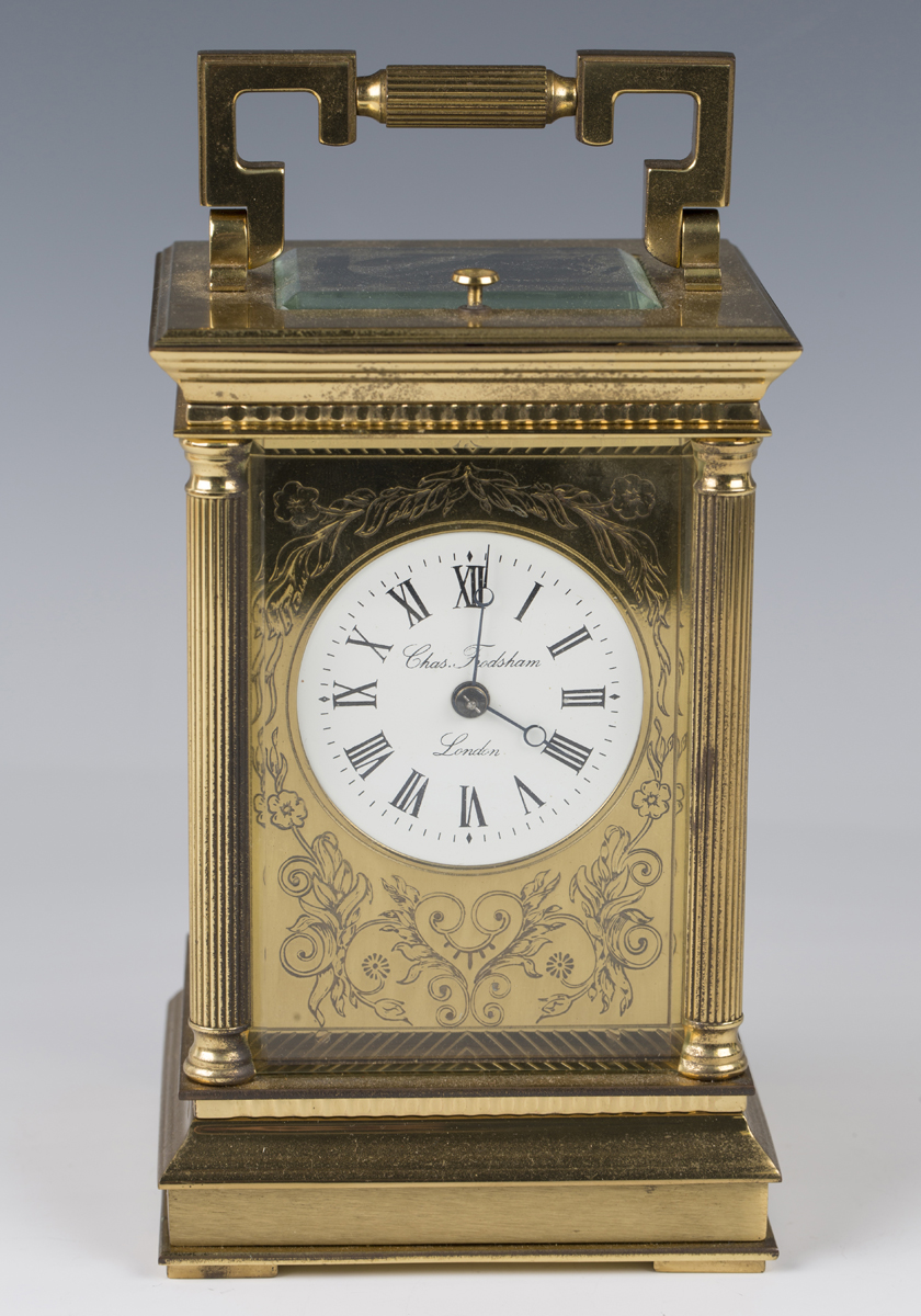 A late 20th century lacquered brass cased carriage clock with eight day ...