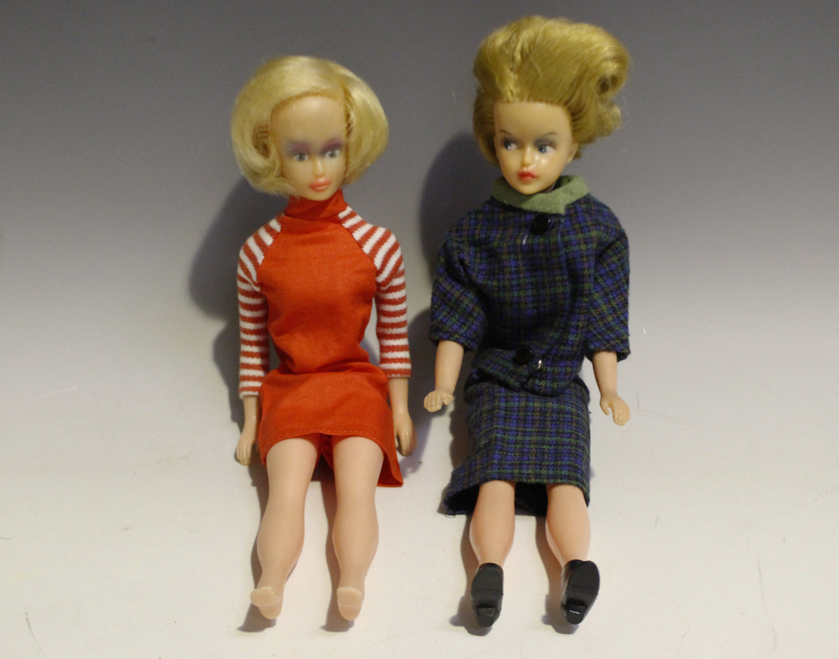 A Palitoy Tressy doll with blonde hair and painted features, wearing a ...