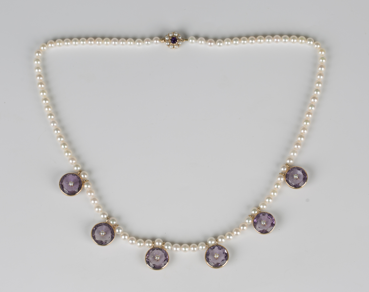 A gold, amethyst and cultured pearl necklace, formed as a single row of