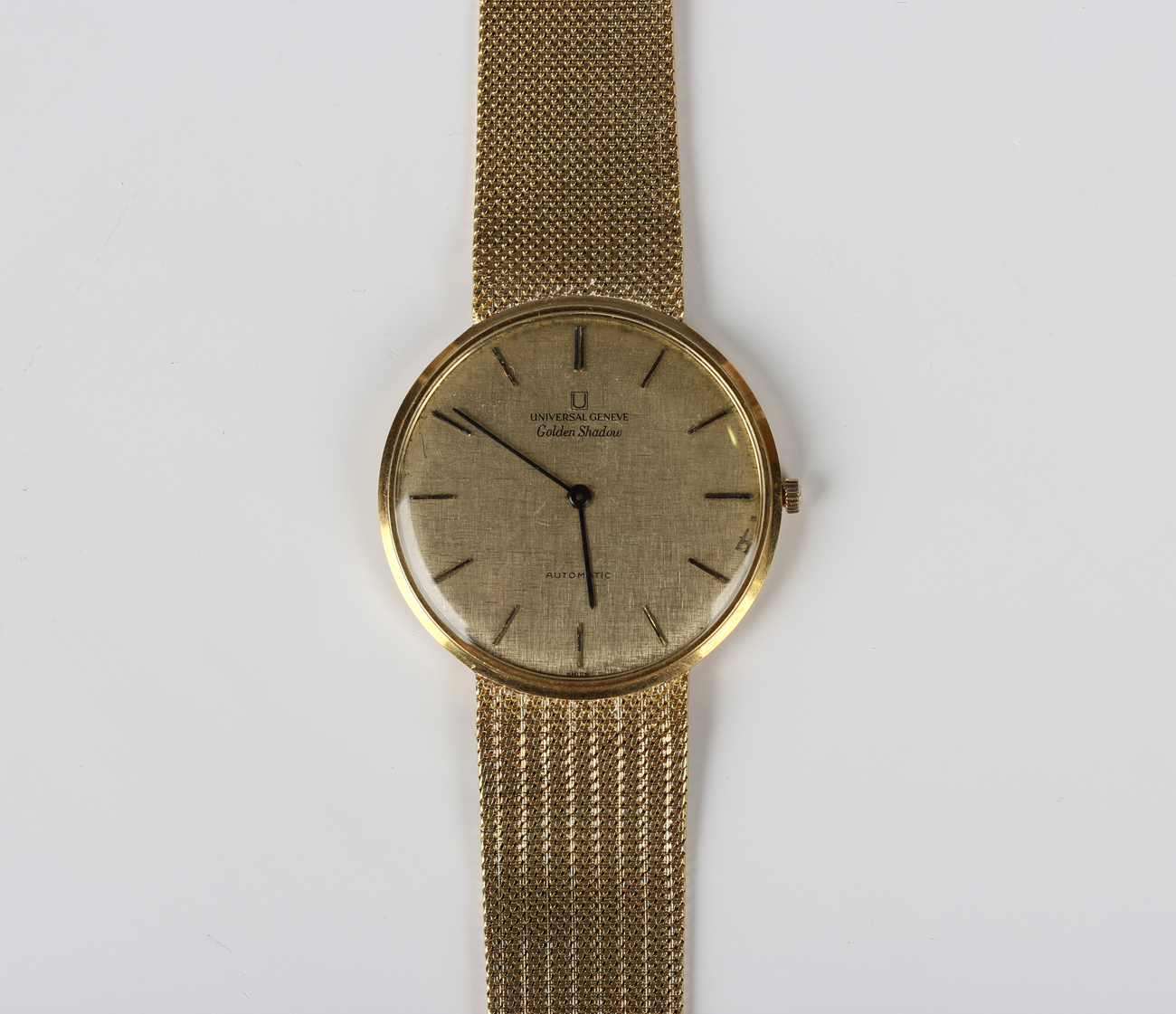 An Universal Genève Golden Shadow Automatic 18ct gold circular cased ...