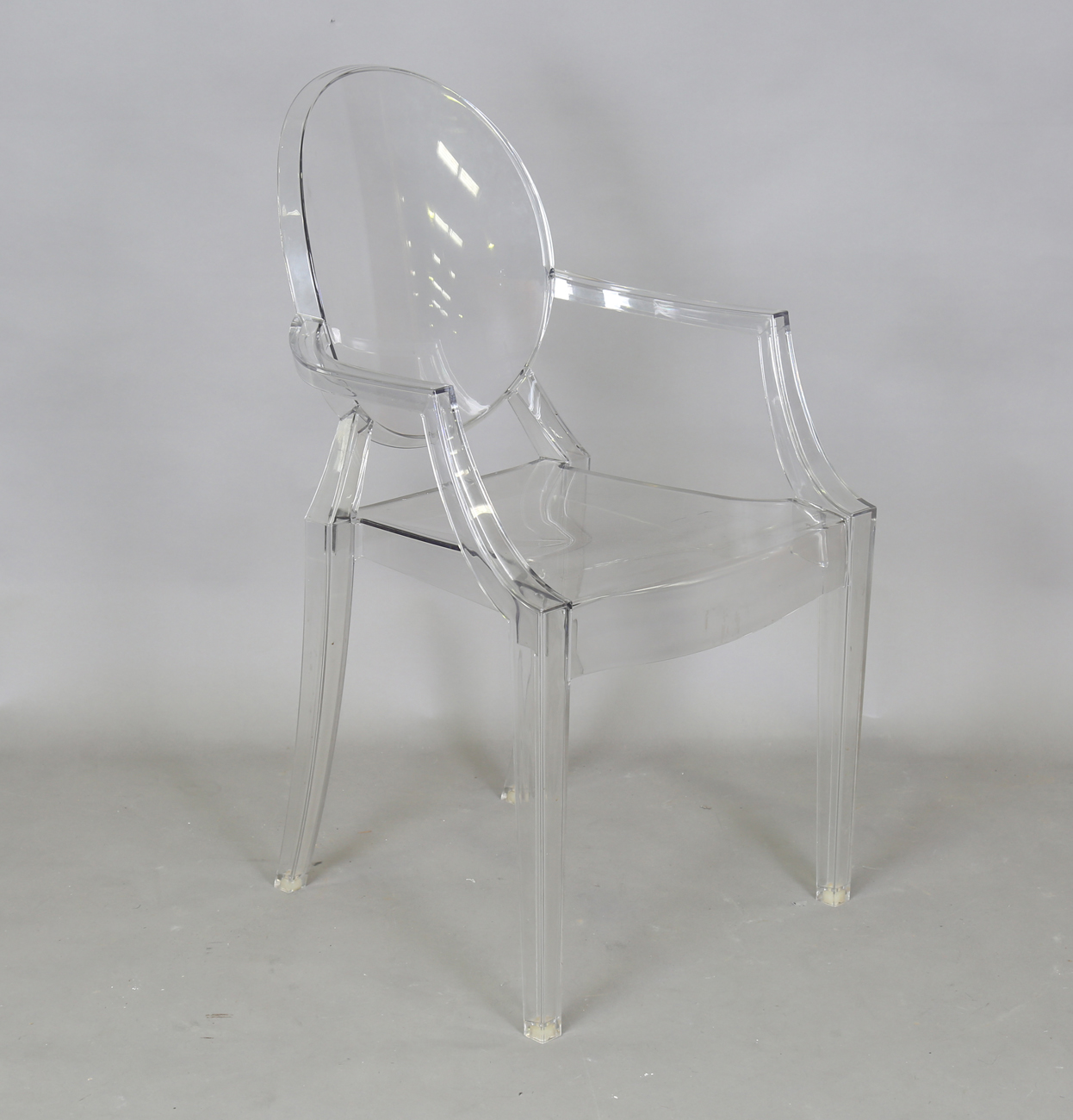 A Modern Louis Ghost Clear Polycarbonate Armchair Made By Kartell And 