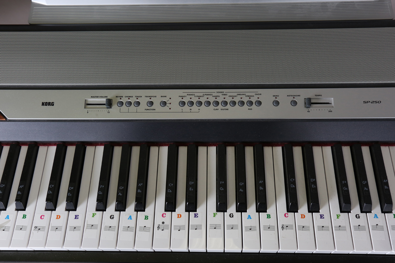 A Korg SP-250 electric keyboard, width 130cm, together with A Korg SP-250 electric keyboard, width 130cm, together with