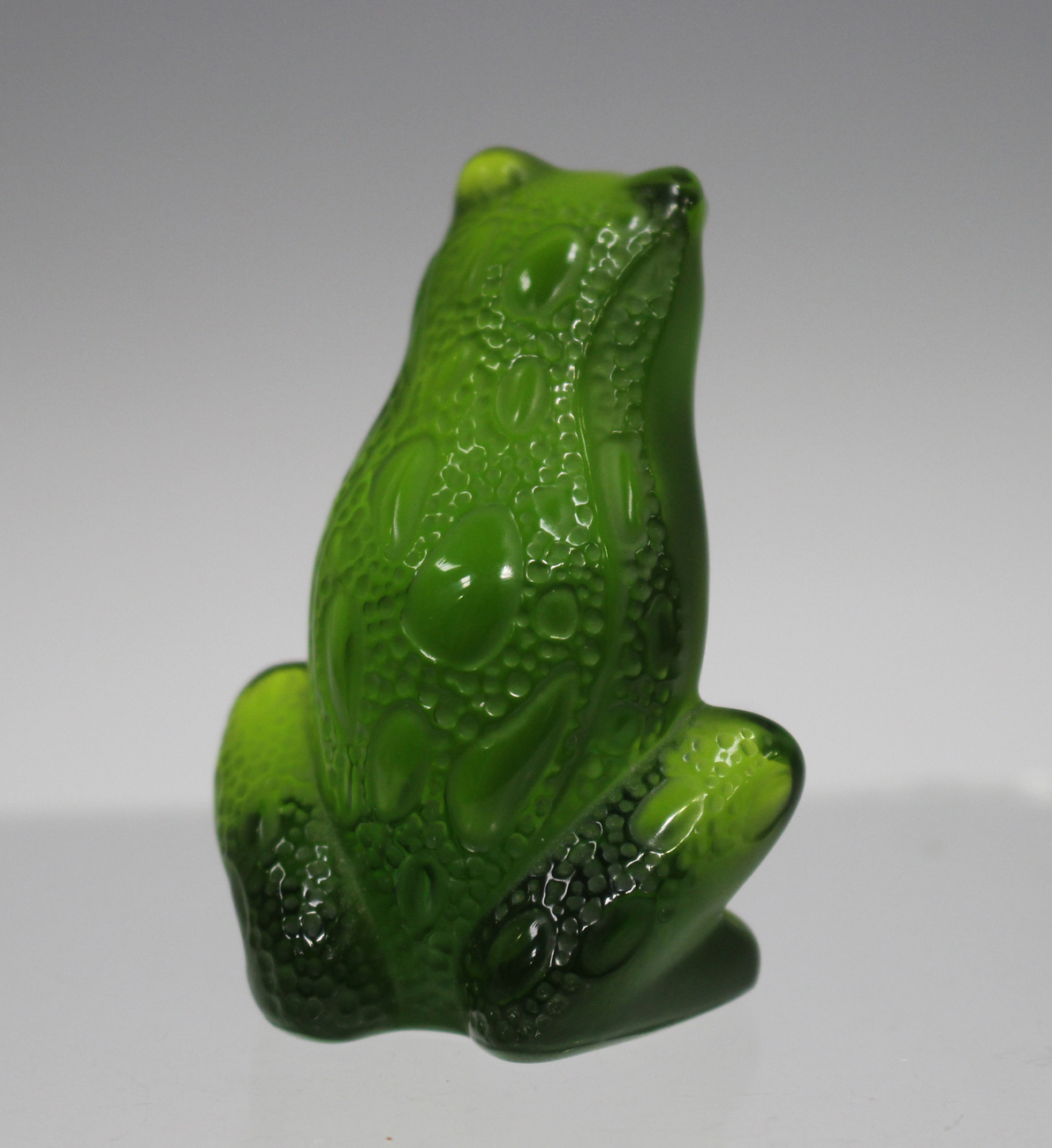 A Lalique glass model of a frog, modern, of dark green tint