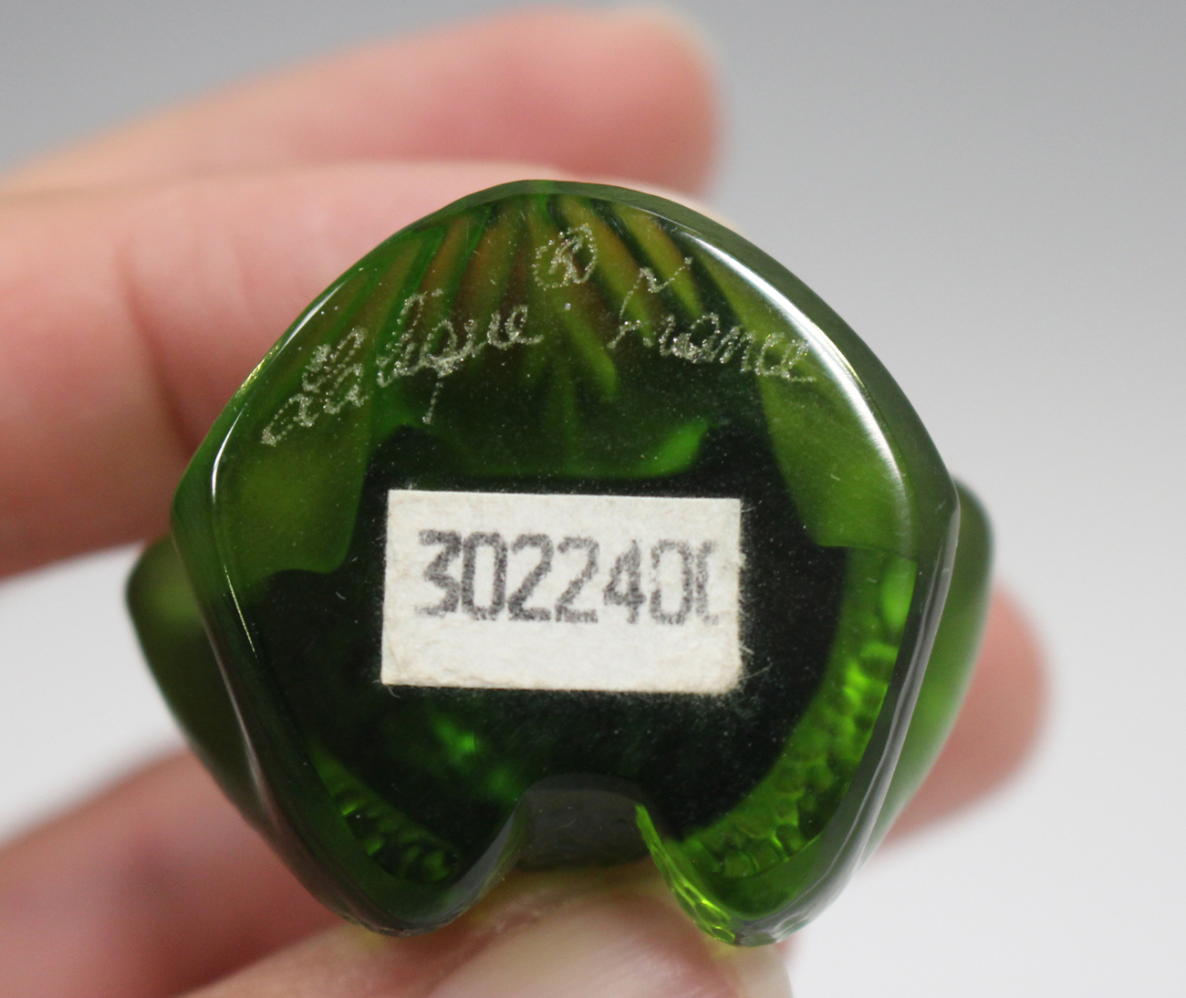 A Lalique glass model of a frog, modern, of dark green tint