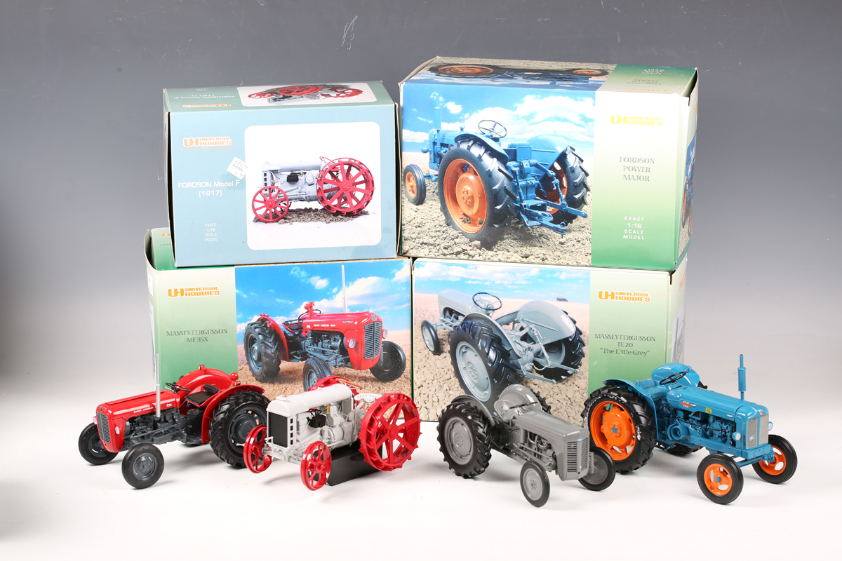 Six Universal Hobbies 1:16 scale model tractors, comprising