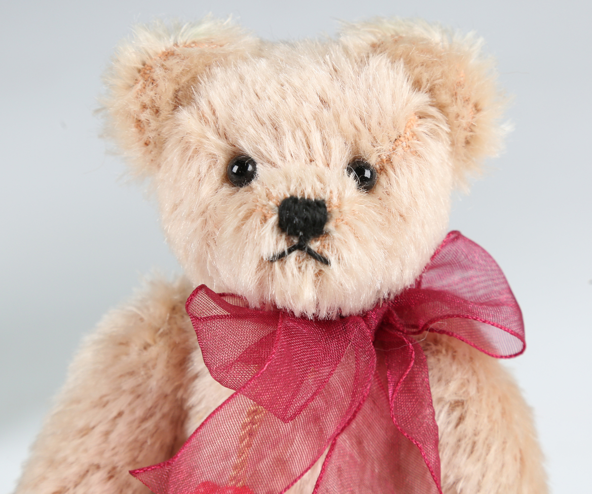 Eight modern Hermann teddy bears, including Sherlock Holmes