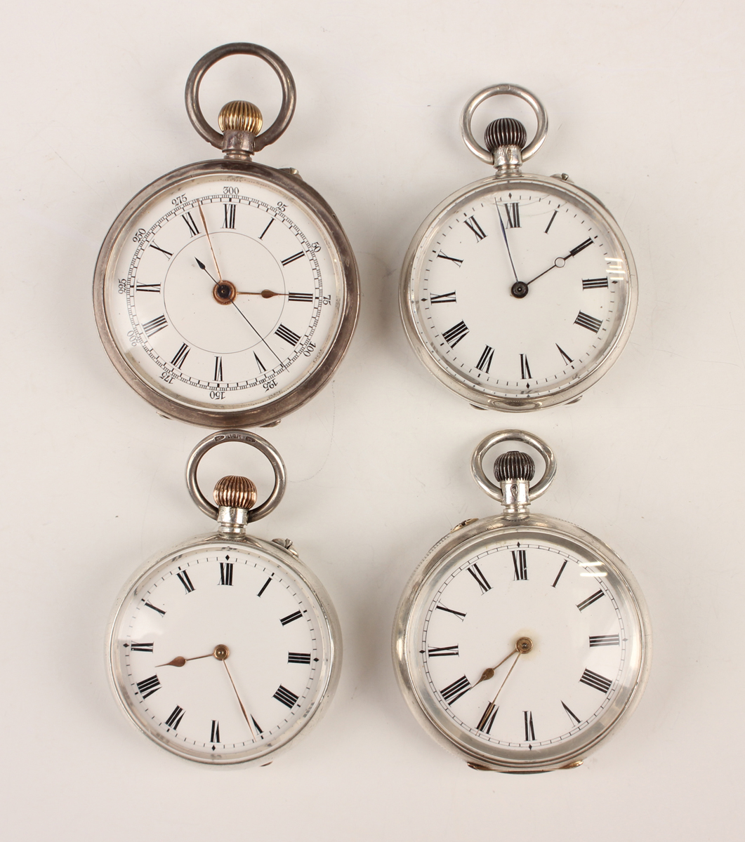A group of four silver keyless wind open-faced ladies' fob watches ...