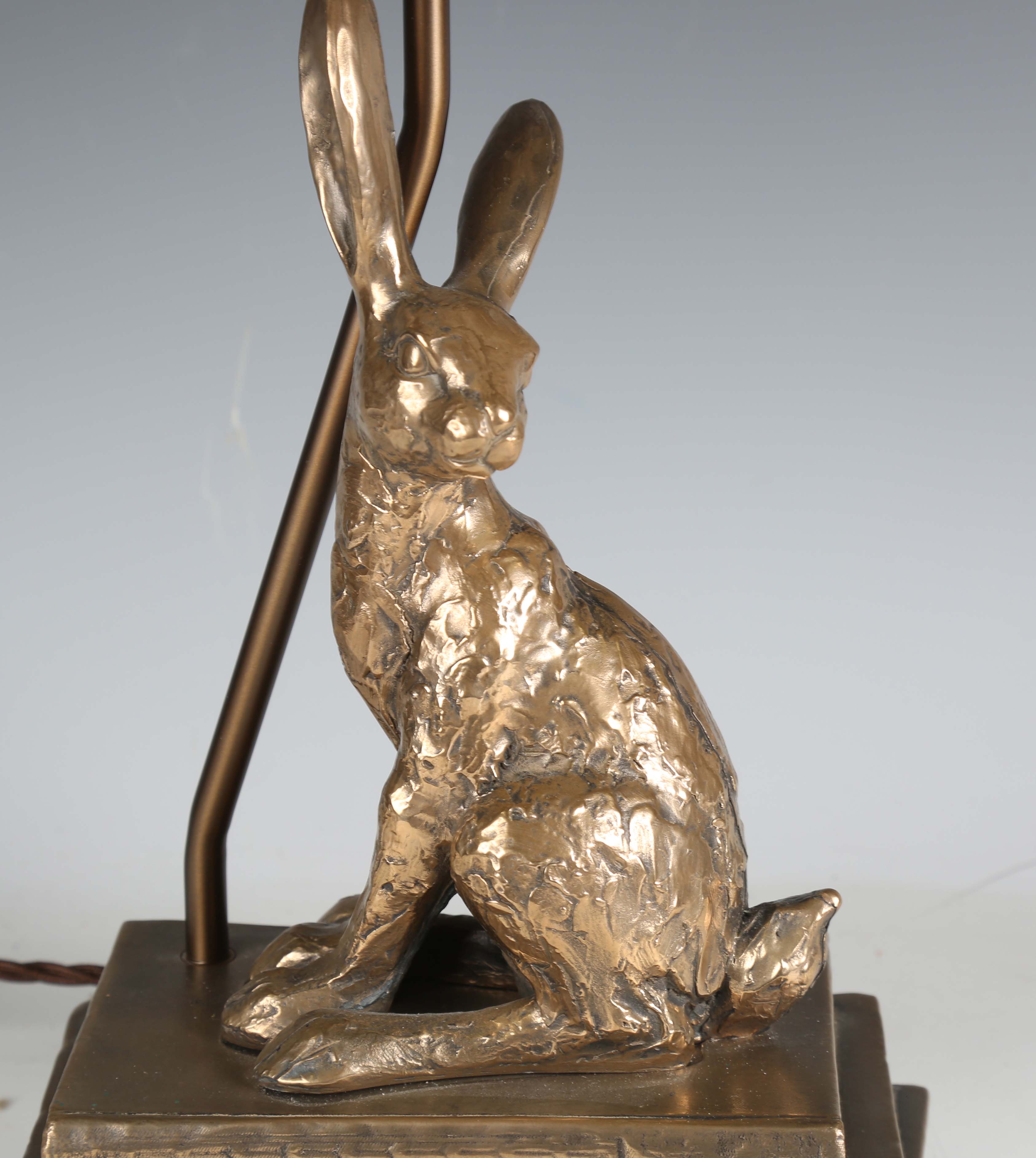 A modern David Hunt bronzed resin table lamp the support modelled