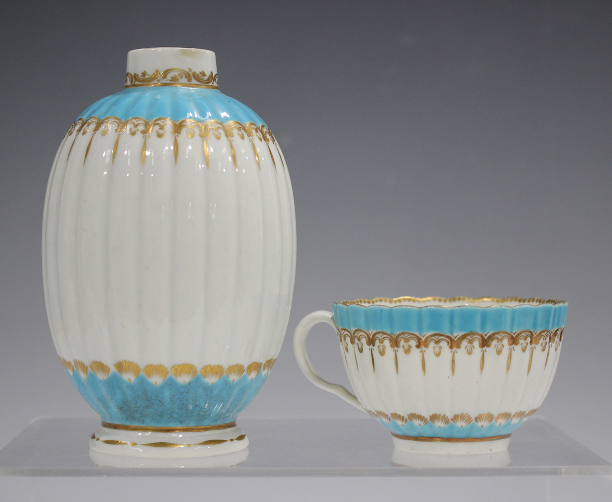 A Worcester porcelain turquoise glazed trio, circa 1770, painted