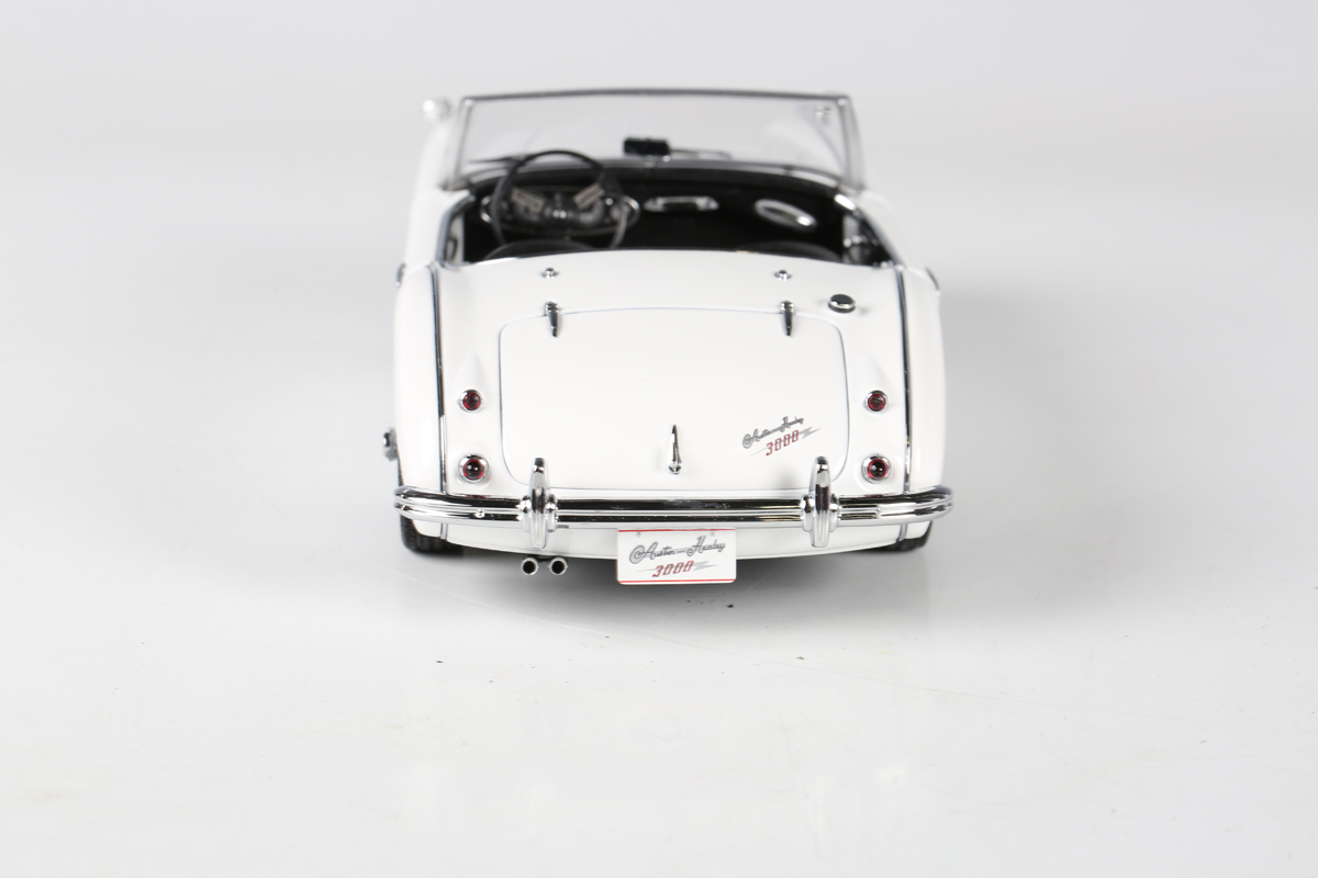 Two AutoArt 1:18 scale model cars, comprising Austin Healey