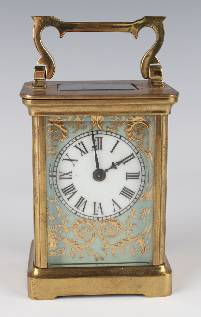 A 20th century brass and porcelain carriage timepiece, the porcelain ...