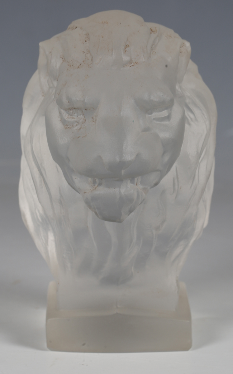 A Red Ashay satin glass car mascot, moulded in the form of a